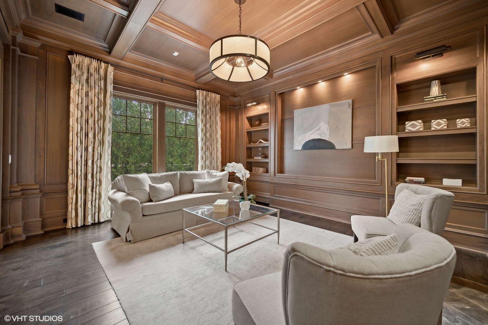 931 Sunset Road Winnetka, IL 60093 - Photo 24 of 42 a living room with furniture a chandelier and a large window