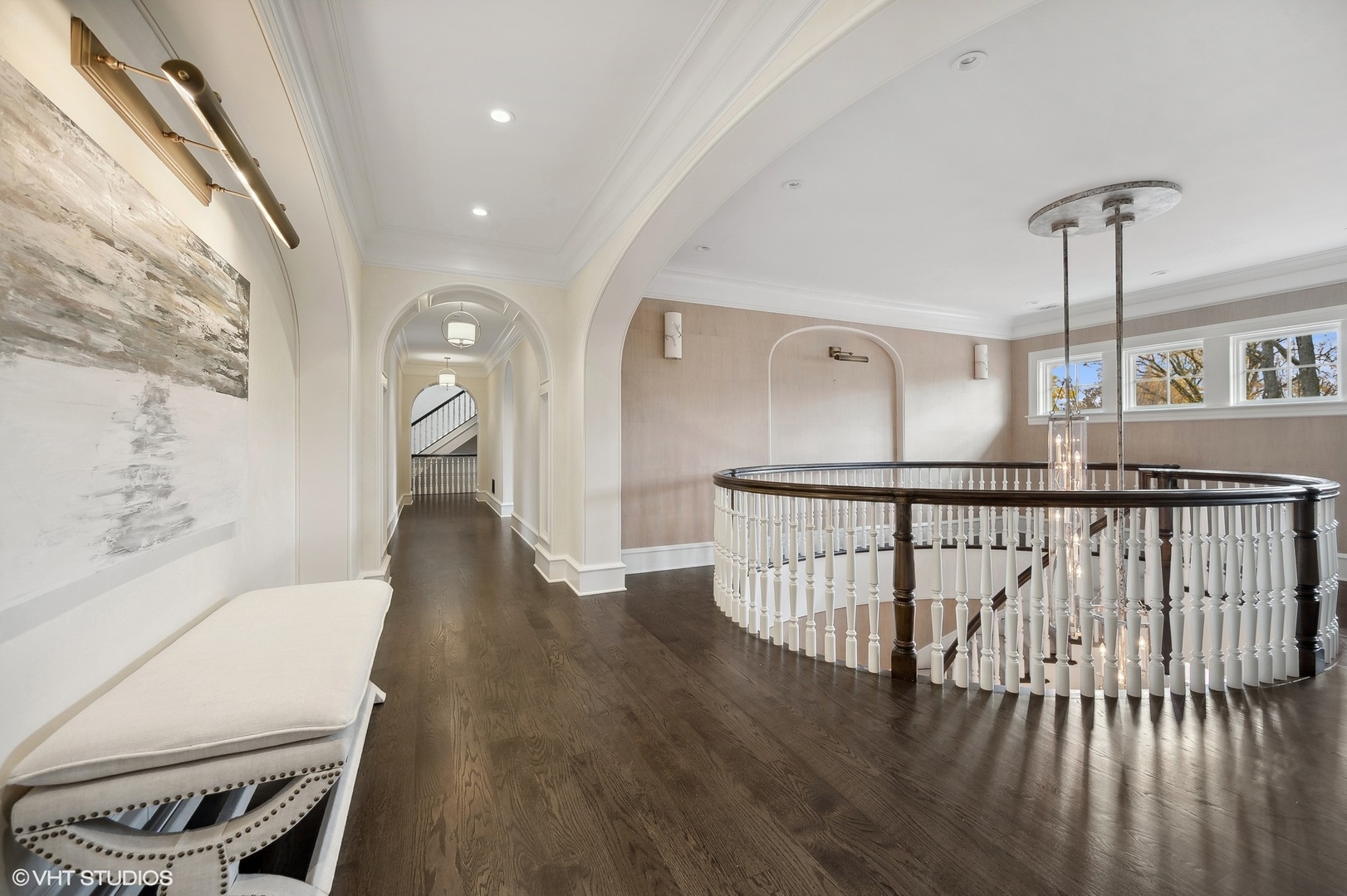 931 Sunset Road Winnetka, IL 60093 - Photo 30 of 42 a view of a hallway with wooden floor and stairs