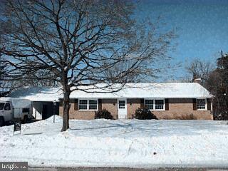 1835 Lilac Road York, PA 17408 - Photo 1 of 1 a front view of a house with a yard