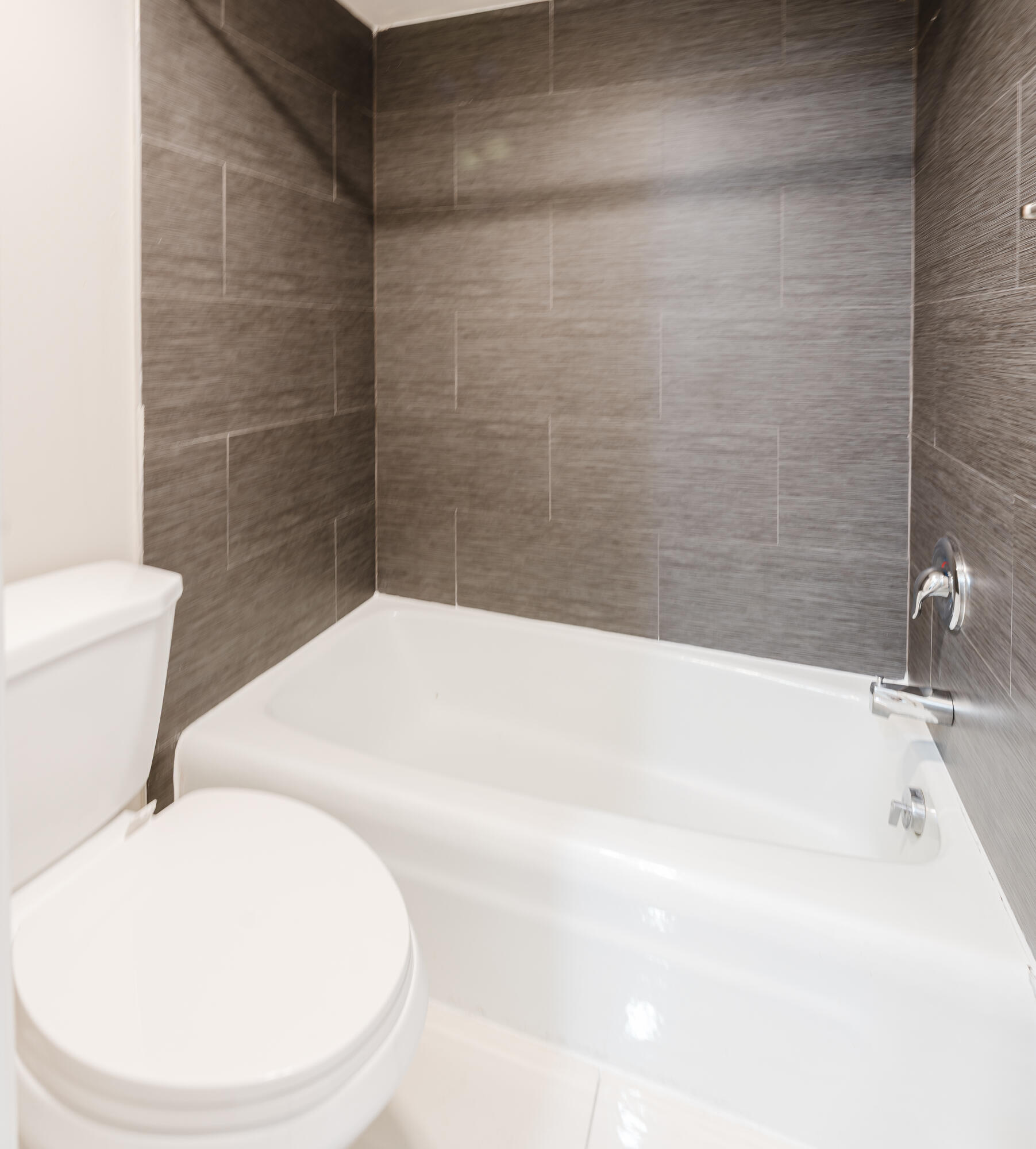 859 Jeffery Street, Unit 208 Boca Raton, FL 33487 - Photo 26 of 39 a bathroom with a white tub