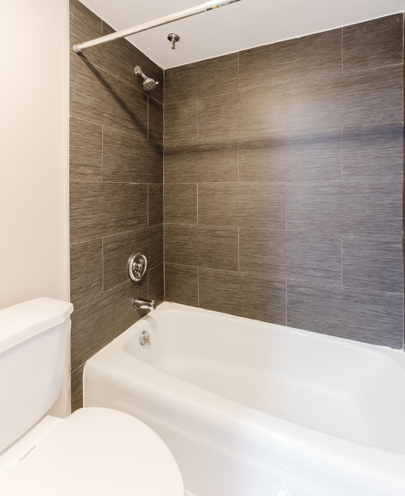 859 Jeffery Street, Unit 208 Boca Raton, FL 33487 - Photo 38 of 39 a bathroom with a bathtub and shower