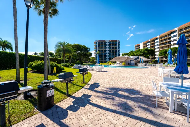 a view of a swimming pool with a patio