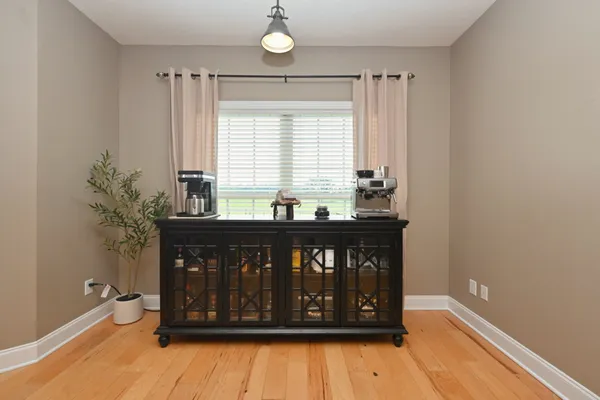 a view of wooden floor with a window