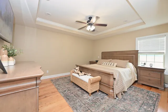 a bathroom with a granite countertop sink a mirror and a