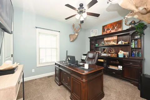 a view of parking garage with cars