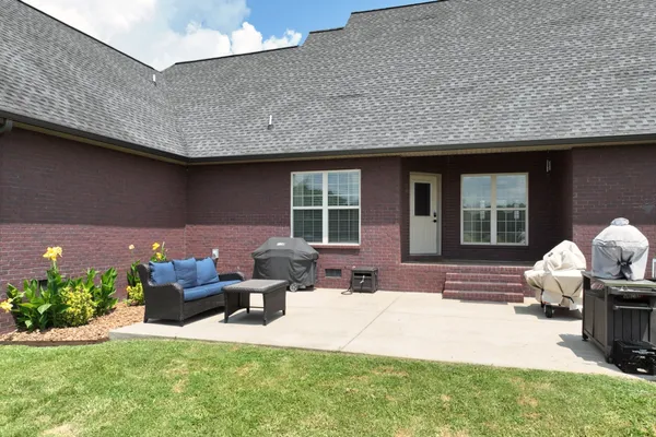 a front view of a house with patio