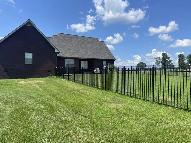 a view of an ocean and a yard