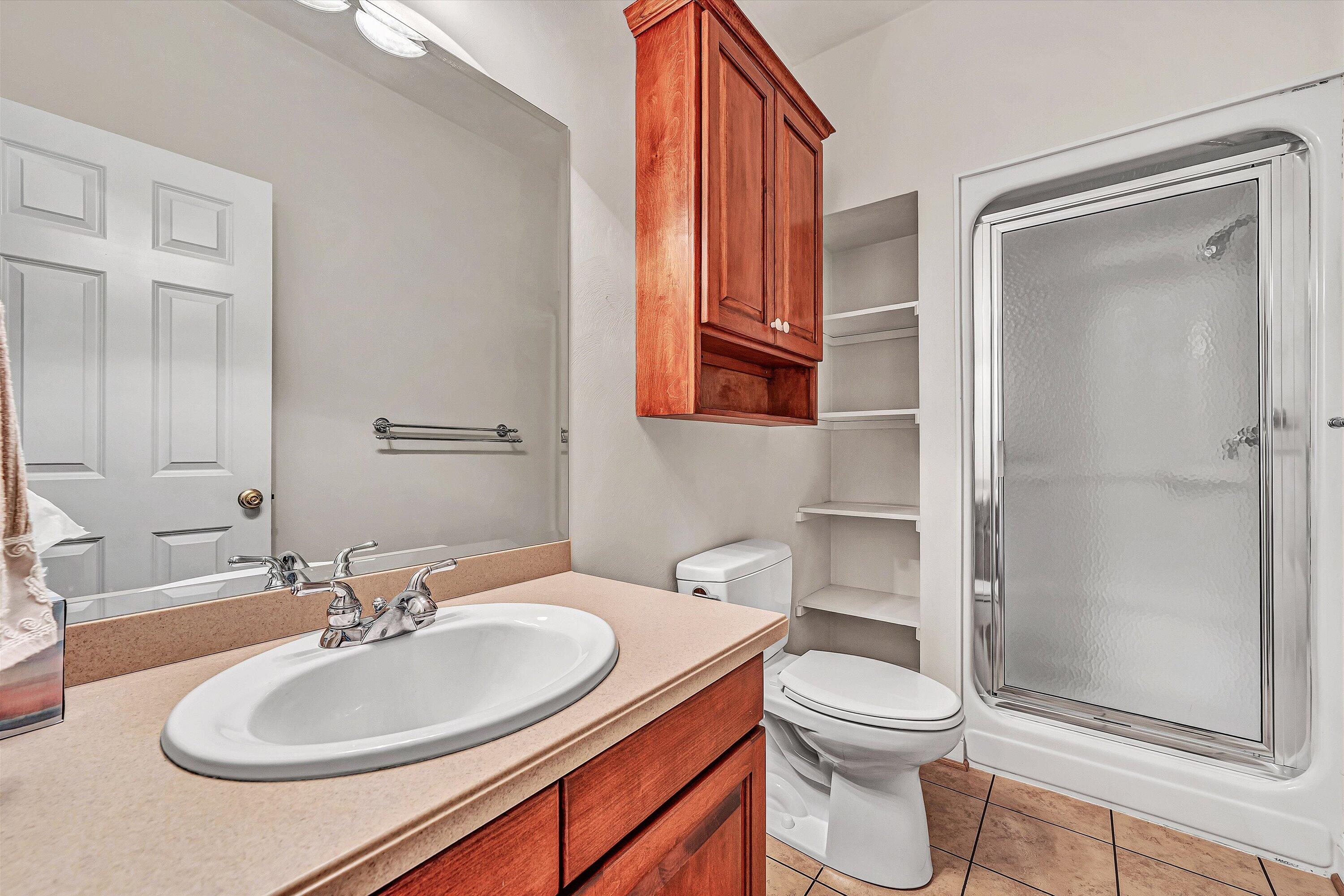 131 Stoney Mill Road Rocky Mount, VA 24151 - Photo 17 of 37 a bathroom with a sink toilet and shower