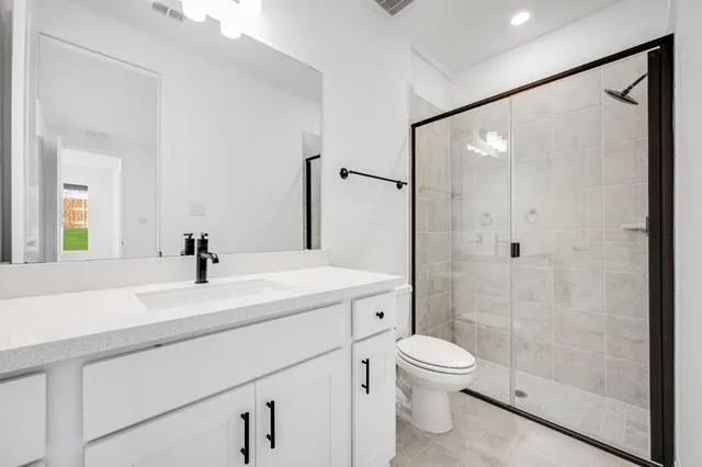 a view of a swimming pool with an outdoor seating and a garden