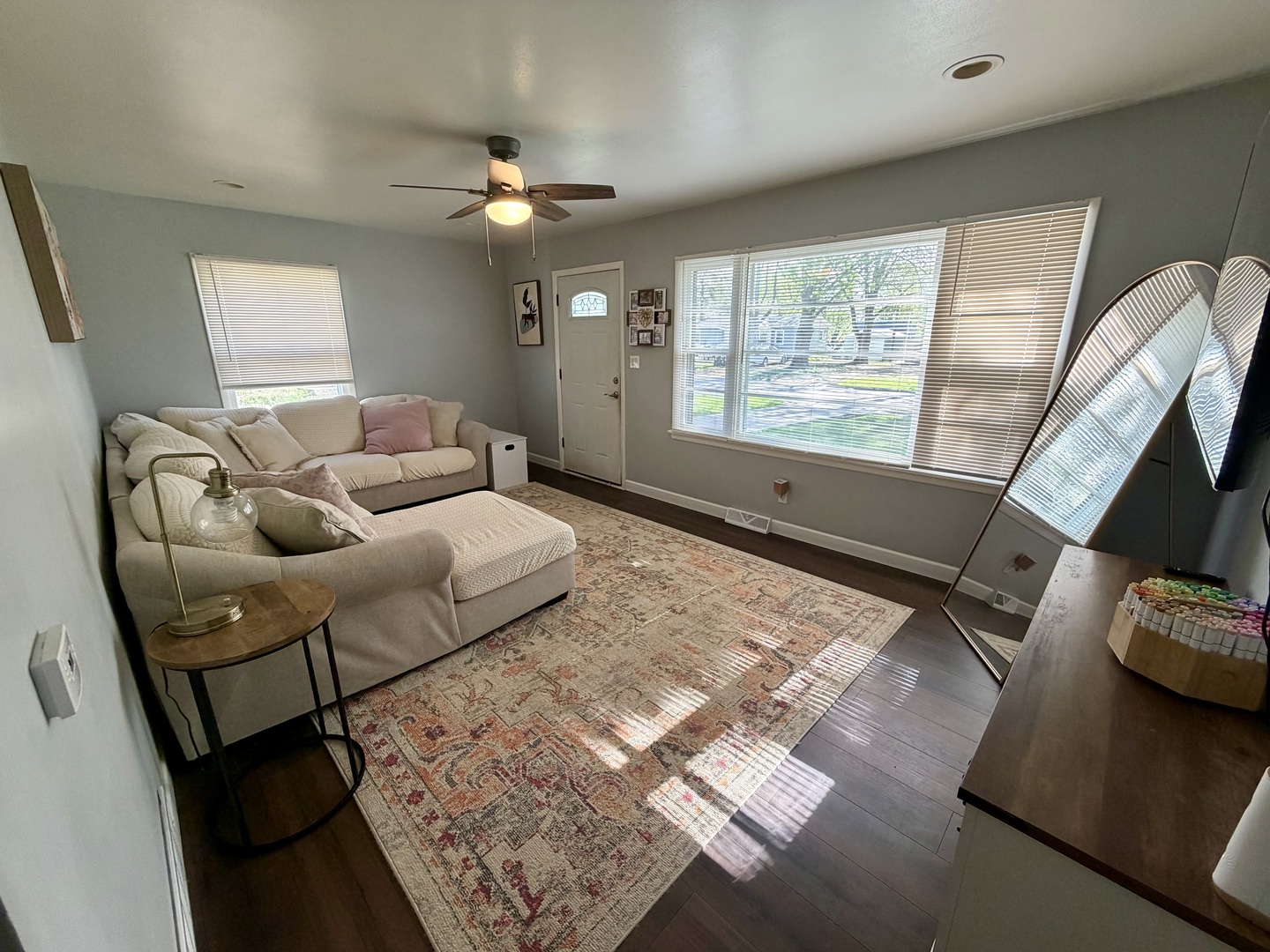 1812 North 6th Street Clinton, IA 52732 - Photo 4 of 14 a living room with furniture and a flat screen tv