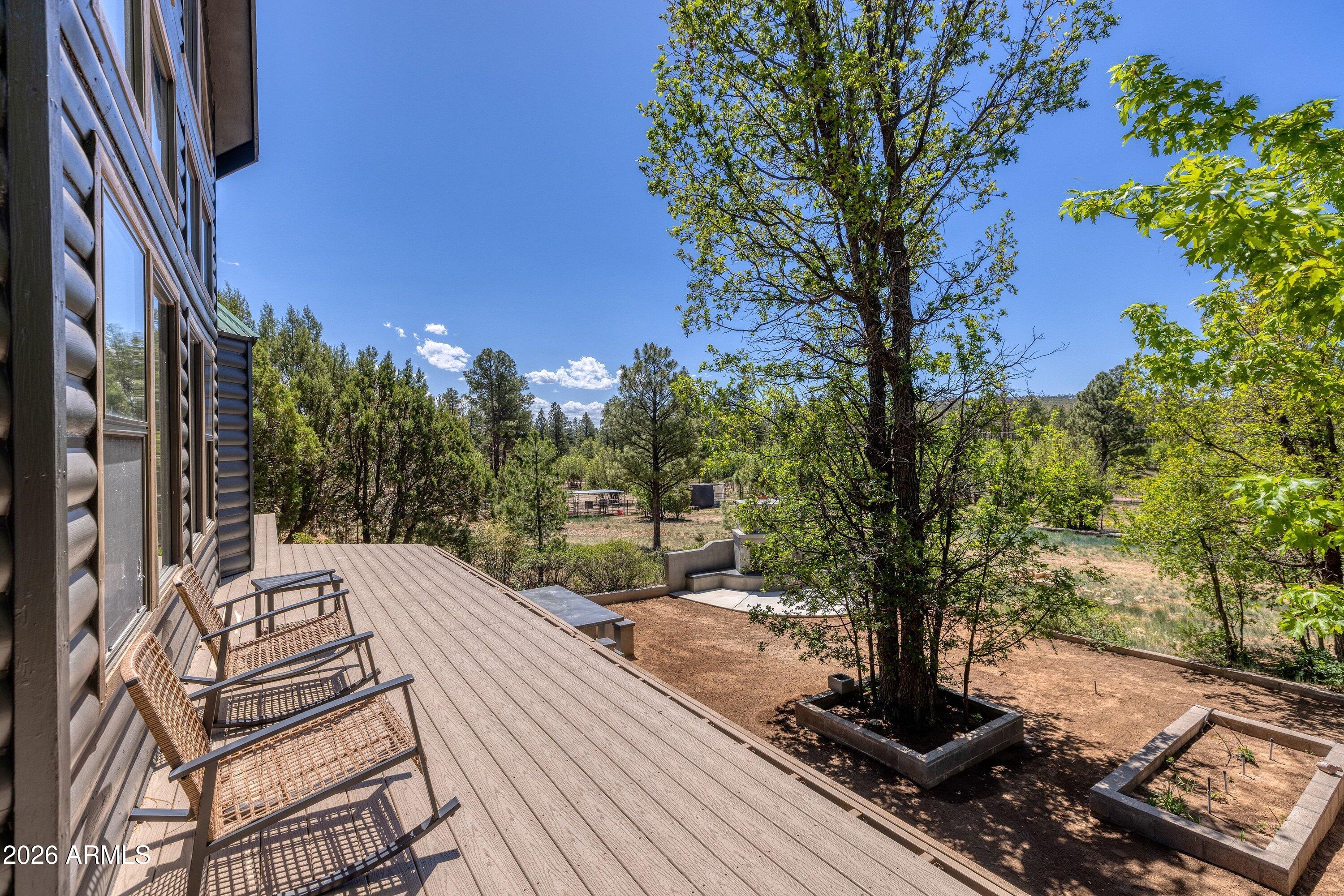 5182 Pinedale Wash Road Pinedale, AZ 85934 - Photo 10 of 54 a view of a backyard with sitting area