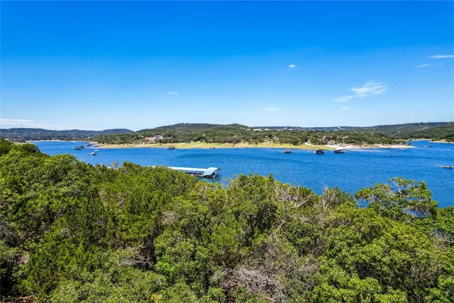 a view of an ocean and a yard