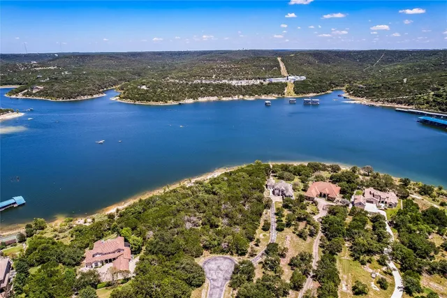 an aerial view of house with mountain view