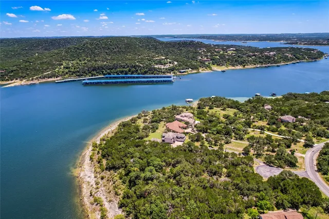 a view of lake with green space