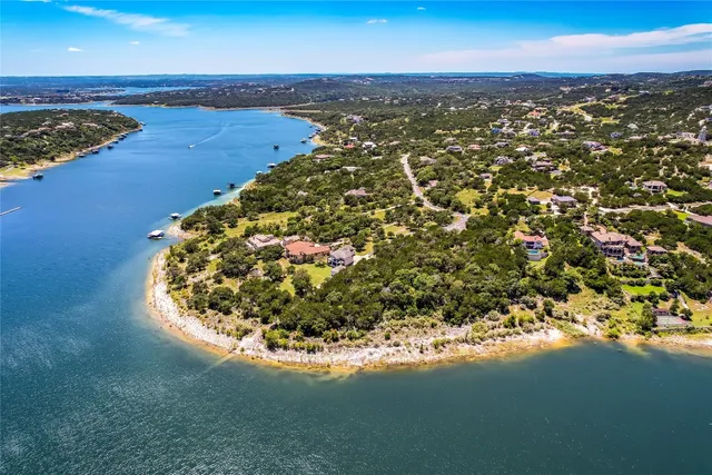 a view of a city with an ocean