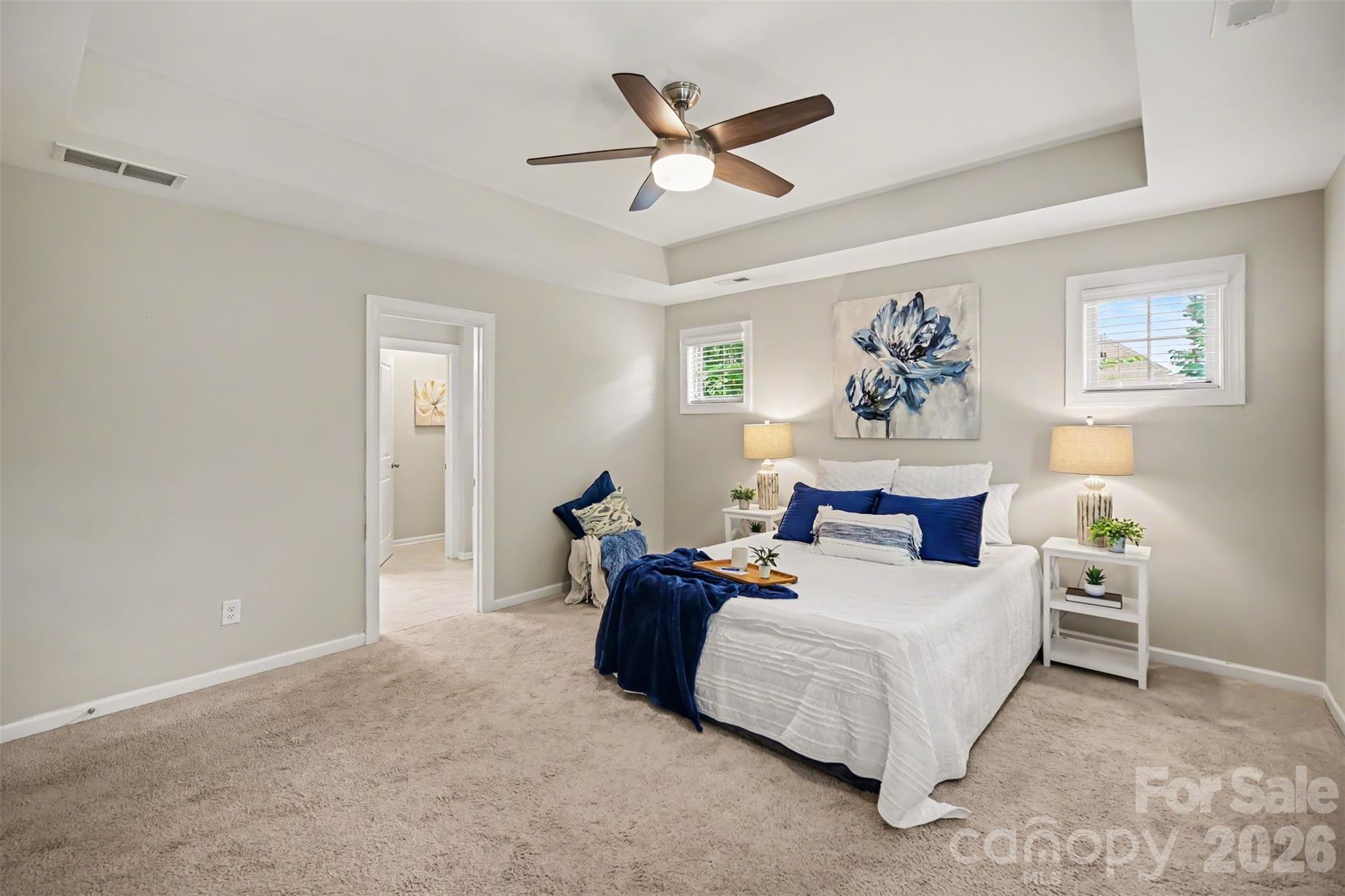 1029 Archibald Avenue Fort Mill, SC 29708 - Photo 18 of 45 a bed room with bed and a ceiling fan