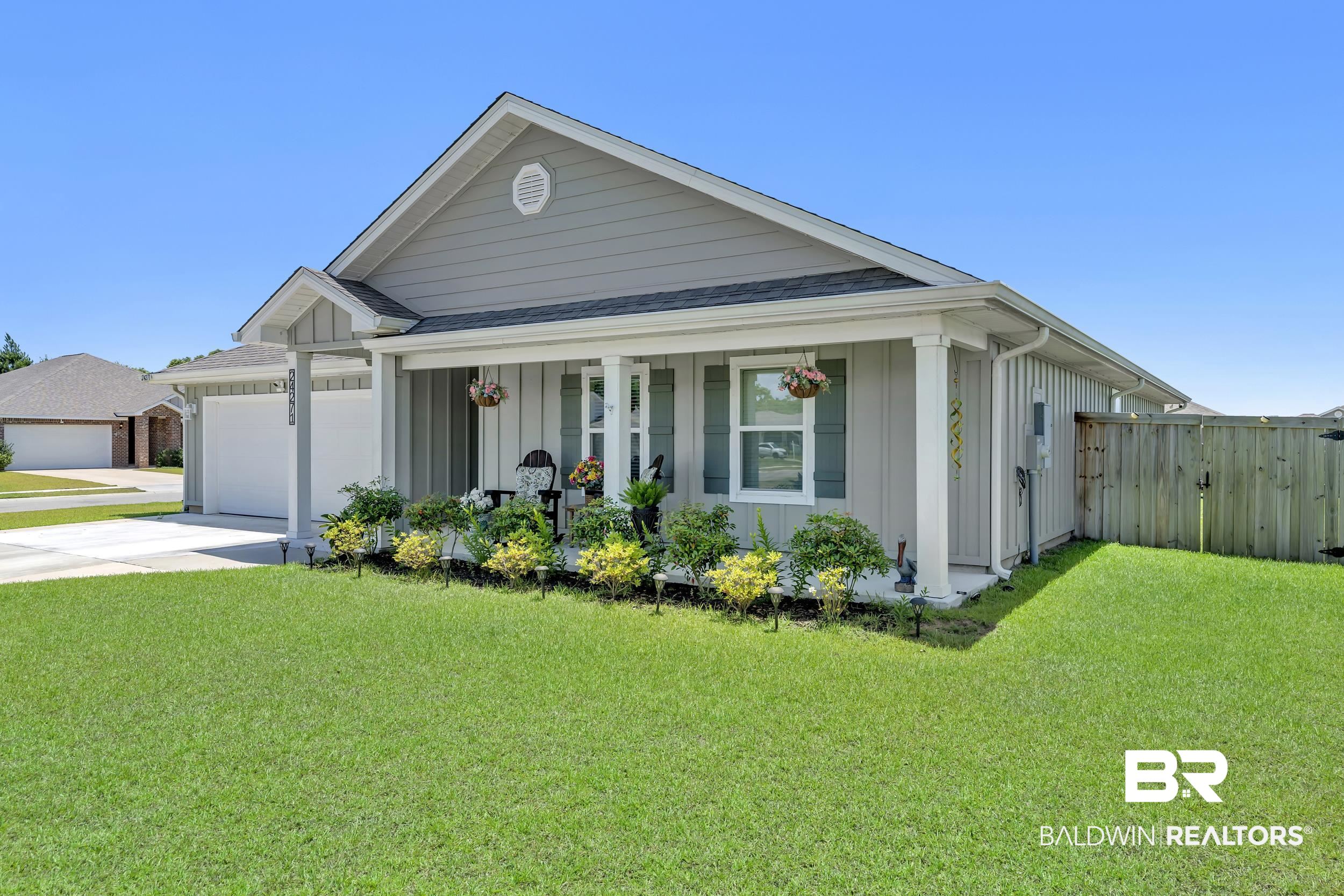 24271 Ringneck Loop Elberta, AL 36530 - Photo 36 of 44 Contemporary single-story residence with a gray siding exterior and white trim