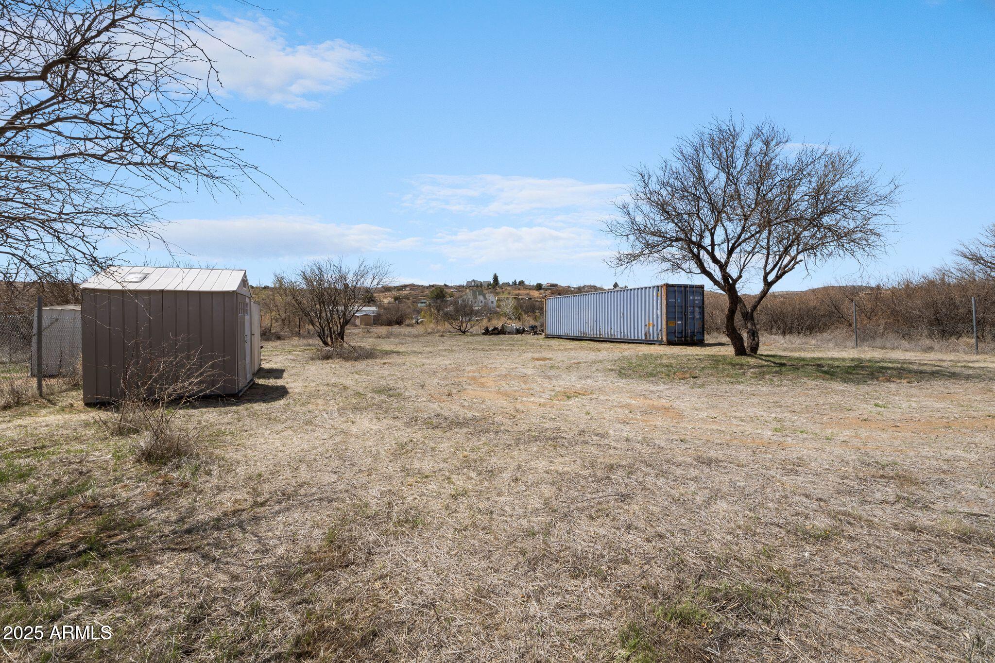 20533 East Aztec Trail, Unit 1272 Mayer, AZ 86333 - Photo 7 of 19 a view of a yard with a tree