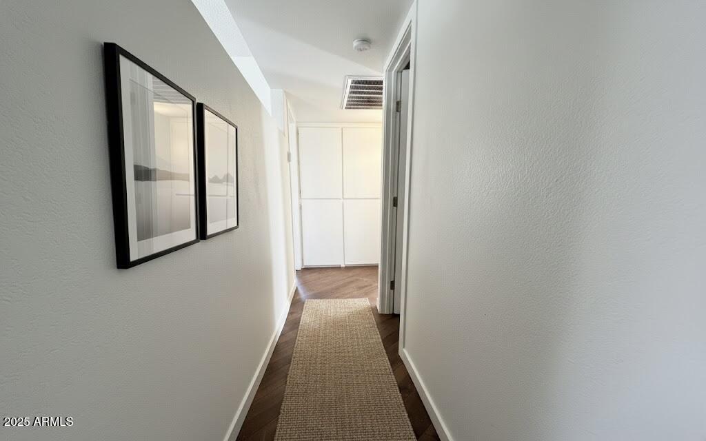 10215 North 8th Avenue, Unit 1 Phoenix, AZ 85021 - Photo 2 of 21 a view of a hallway with wooden floor