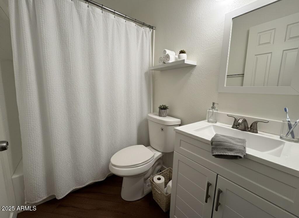 10215 North 8th Avenue, Unit 1 Phoenix, AZ 85021 - Photo 3 of 21 a bathroom with a sink and a toilet
