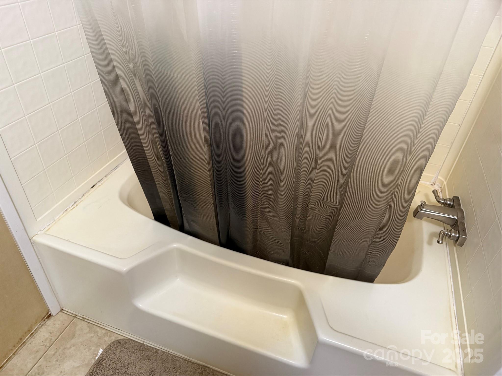 223 Green Acres Road Mooresboro, NC 28114 - Photo 13 of 14 a bathroom with a bathtub