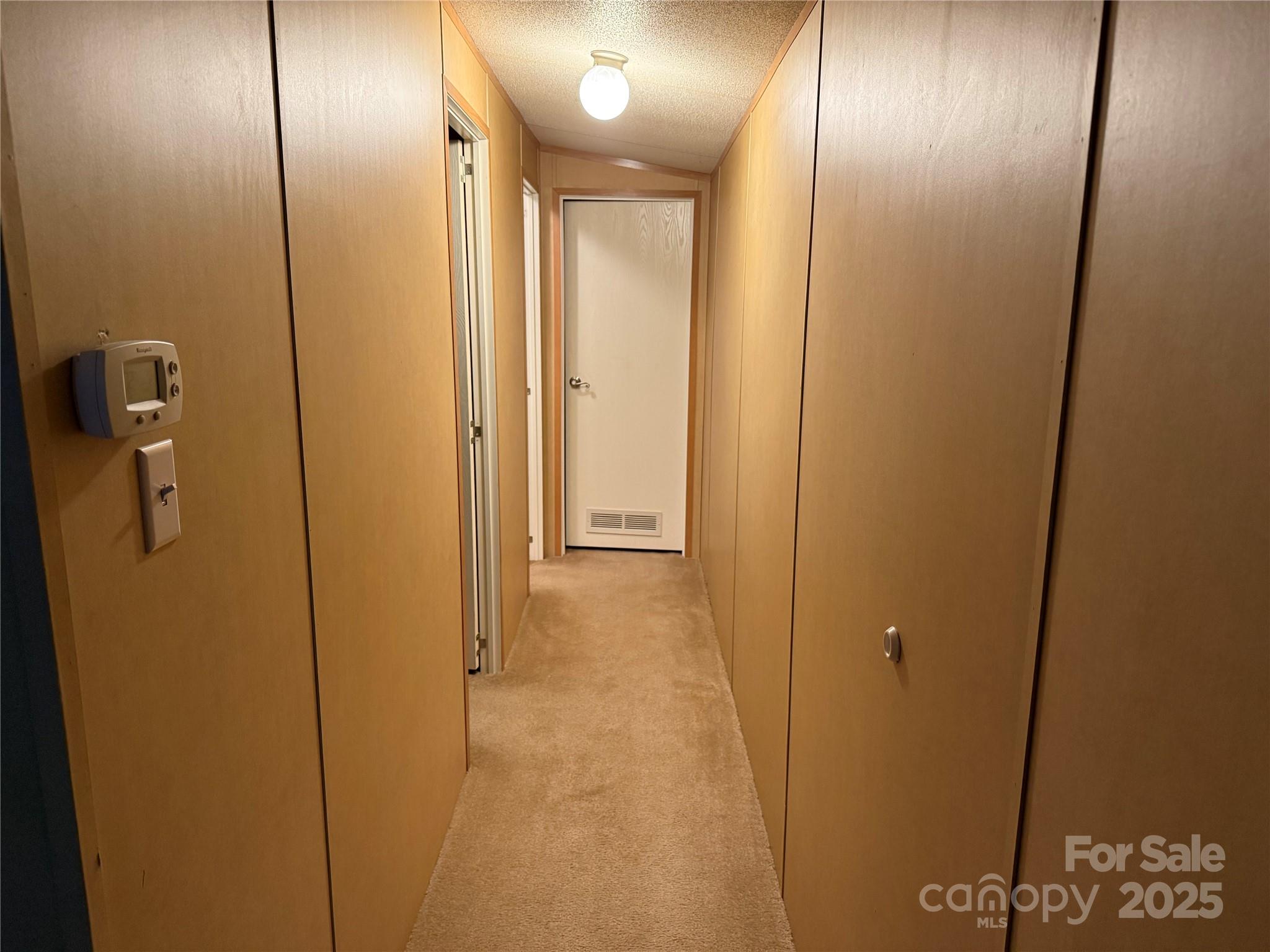 223 Green Acres Road Mooresboro, NC 28114 - Photo 9 of 14 a view of hallway with shower