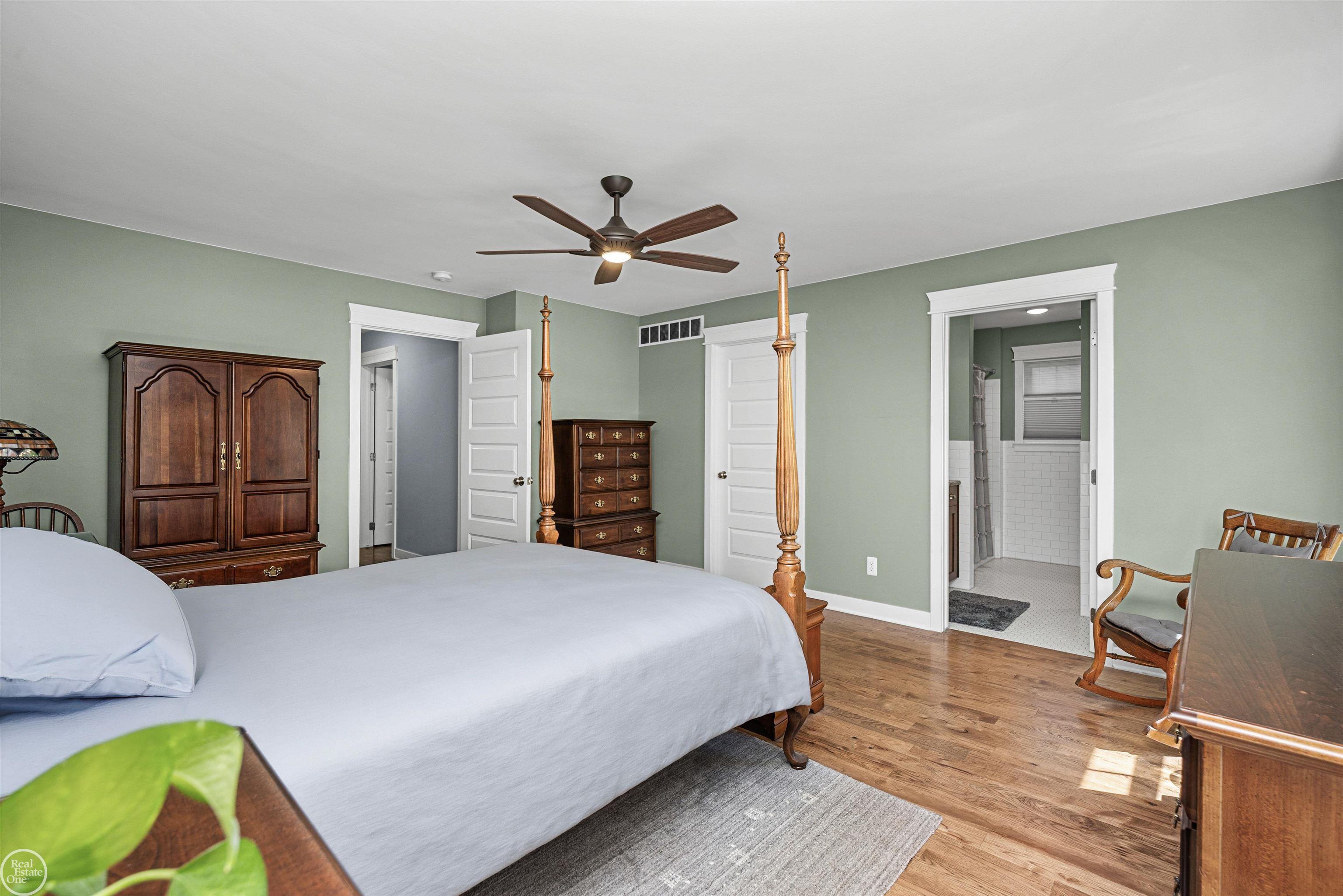 64110 Campground Road Washington, MI 48095 - Photo 51 of 74 Spacious primary suite with lots of natural light is a bright and inviting retreat