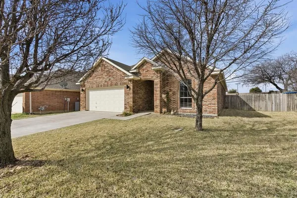 a house with trees in front of it