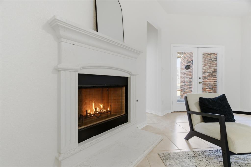 813 Chase Circle Hurst, TX 76053 - Photo 14 of 40 a living room with furniture and a fireplace