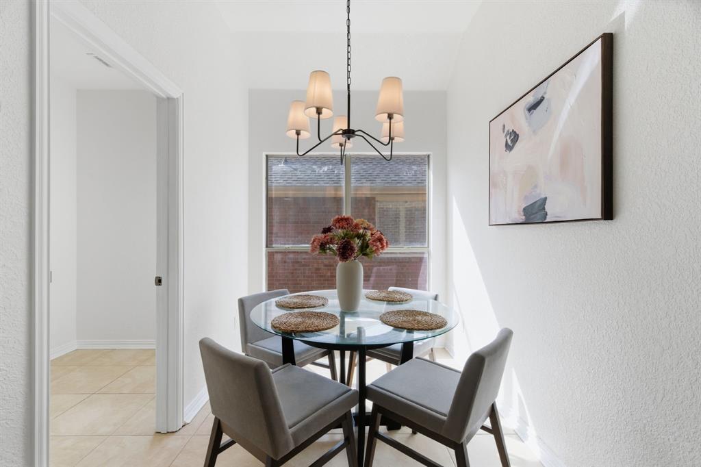 813 Chase Circle Hurst, TX 76053 - Photo 21 of 40 a dining room with a table and chairs