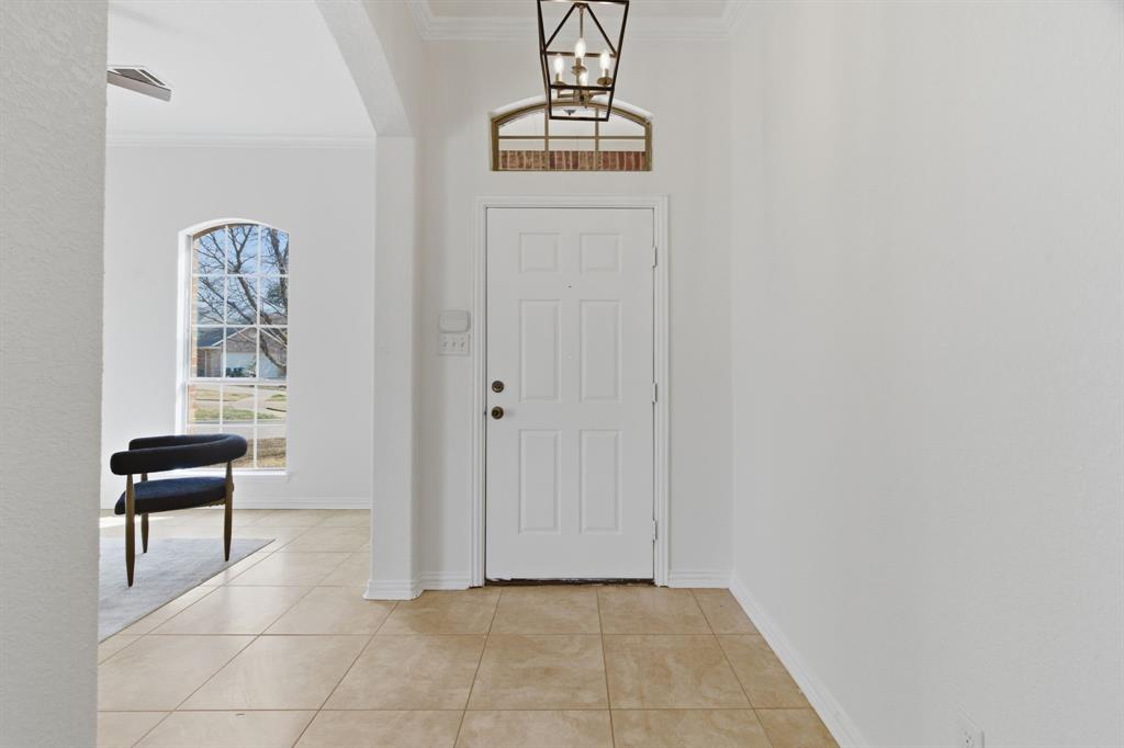 813 Chase Circle Hurst, TX 76053 - Photo 5 of 40 a view of room with window and wooden floor