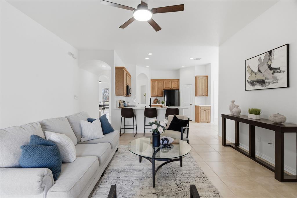 813 Chase Circle Hurst, TX 76053 - Photo 10 of 40 a living room with furniture and kitchen view