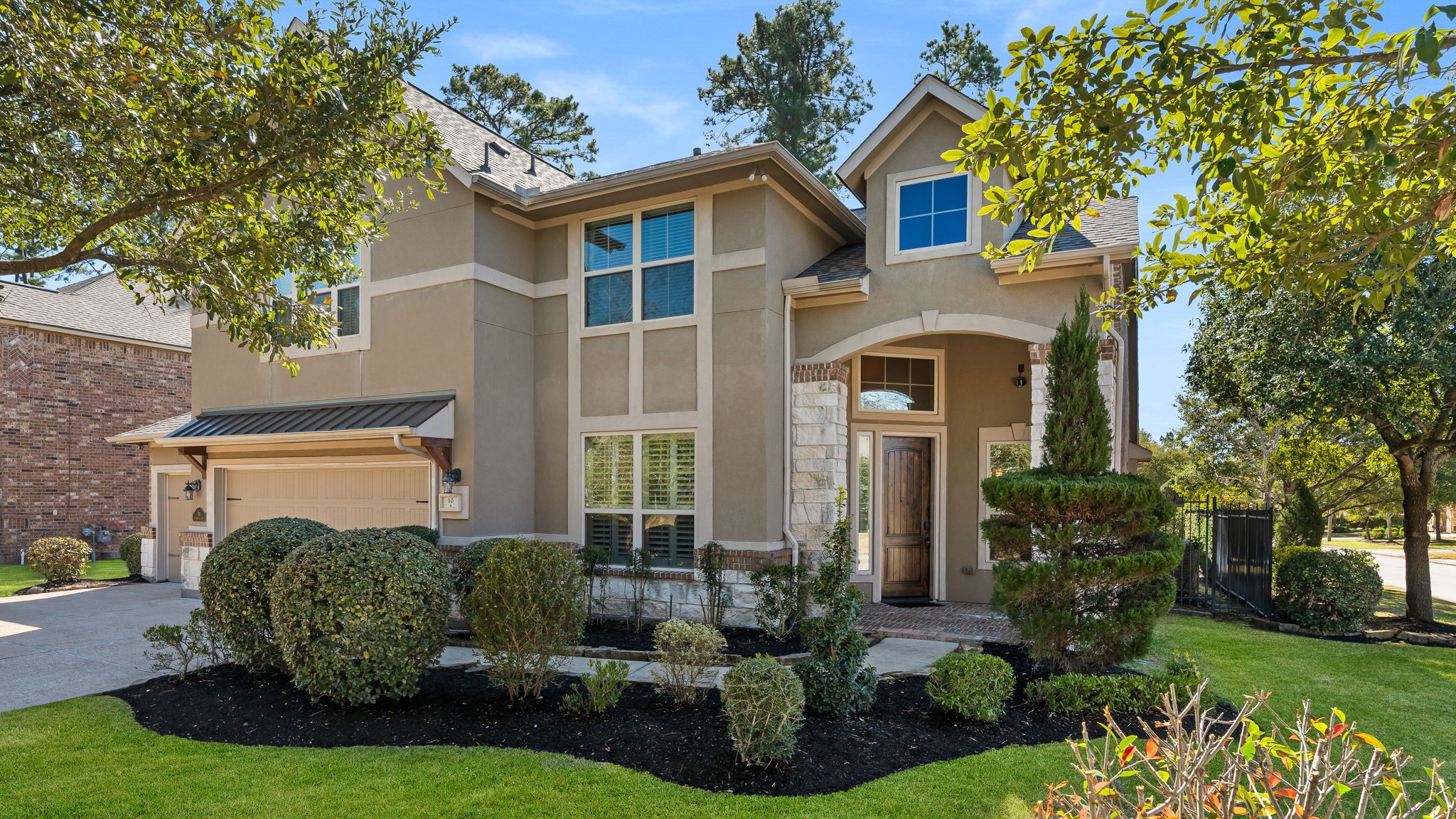 front view of a house with a yard