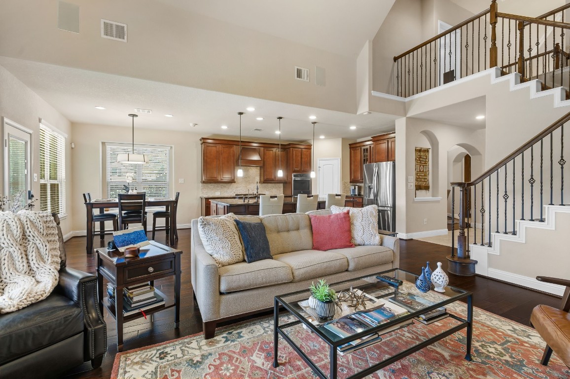 10 Waterfall Way The Woodlands, TX 77375 - Photo 14 of 45 a living room with furniture kitchen view and a table