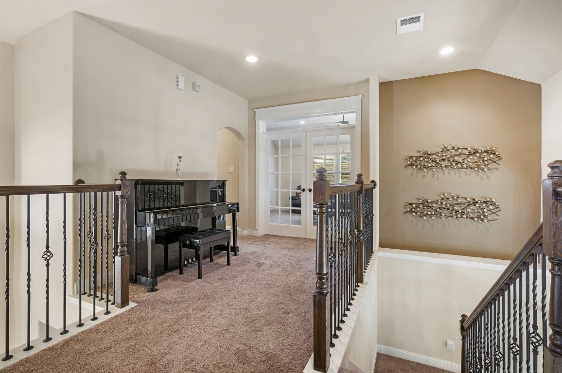 10 Waterfall Way The Woodlands, TX 77375 - Photo 30 of 45 a view of a hallway with seating area