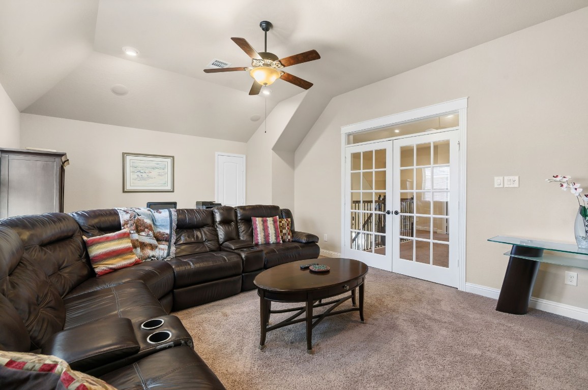 10 Waterfall Way The Woodlands, TX 77375 - Photo 32 of 45 a living room with furniture and a window