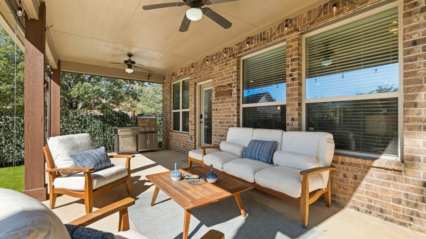 10 Waterfall Way The Woodlands, TX 77375 - Photo 38 of 45 a outdoor living space with patio furniture