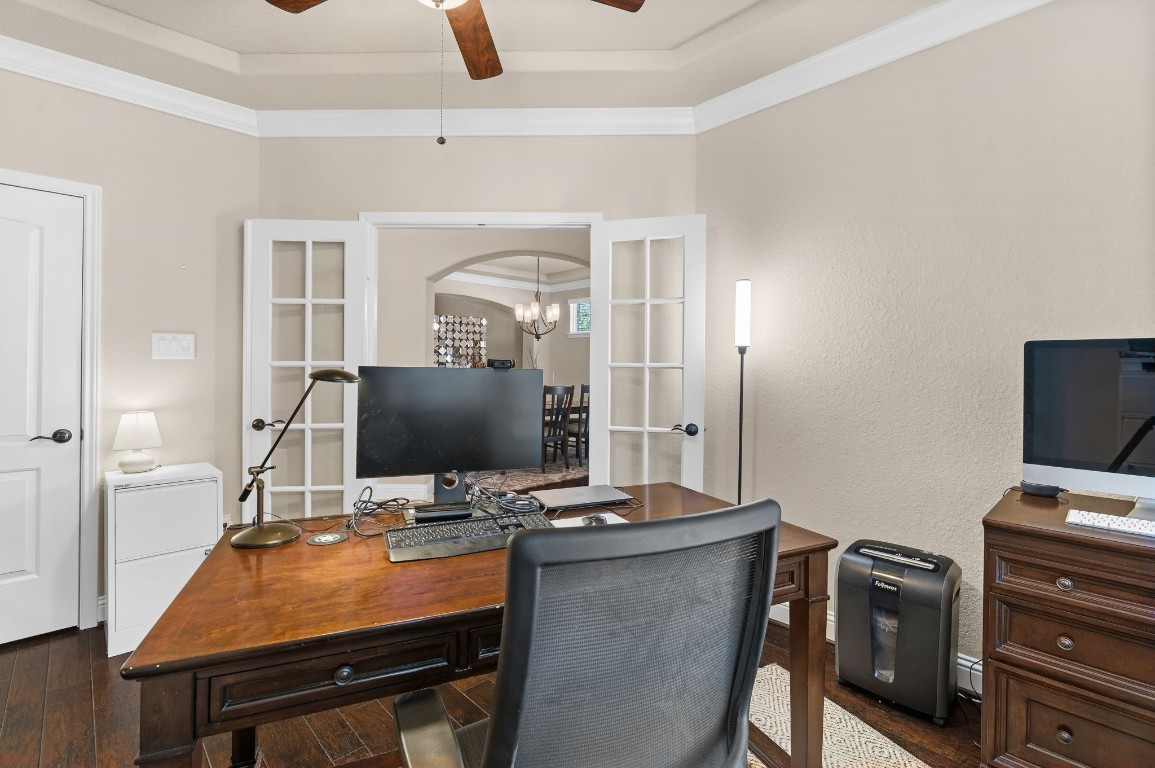10 Waterfall Way The Woodlands, TX 77375 - Photo 10 of 45 a room with furniture and a flat screen tv
