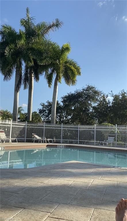 768 Hampton Circle, Unit 188 Naples, FL 34105 - Photo 1 of 11 a view of a balcony with a palm tree