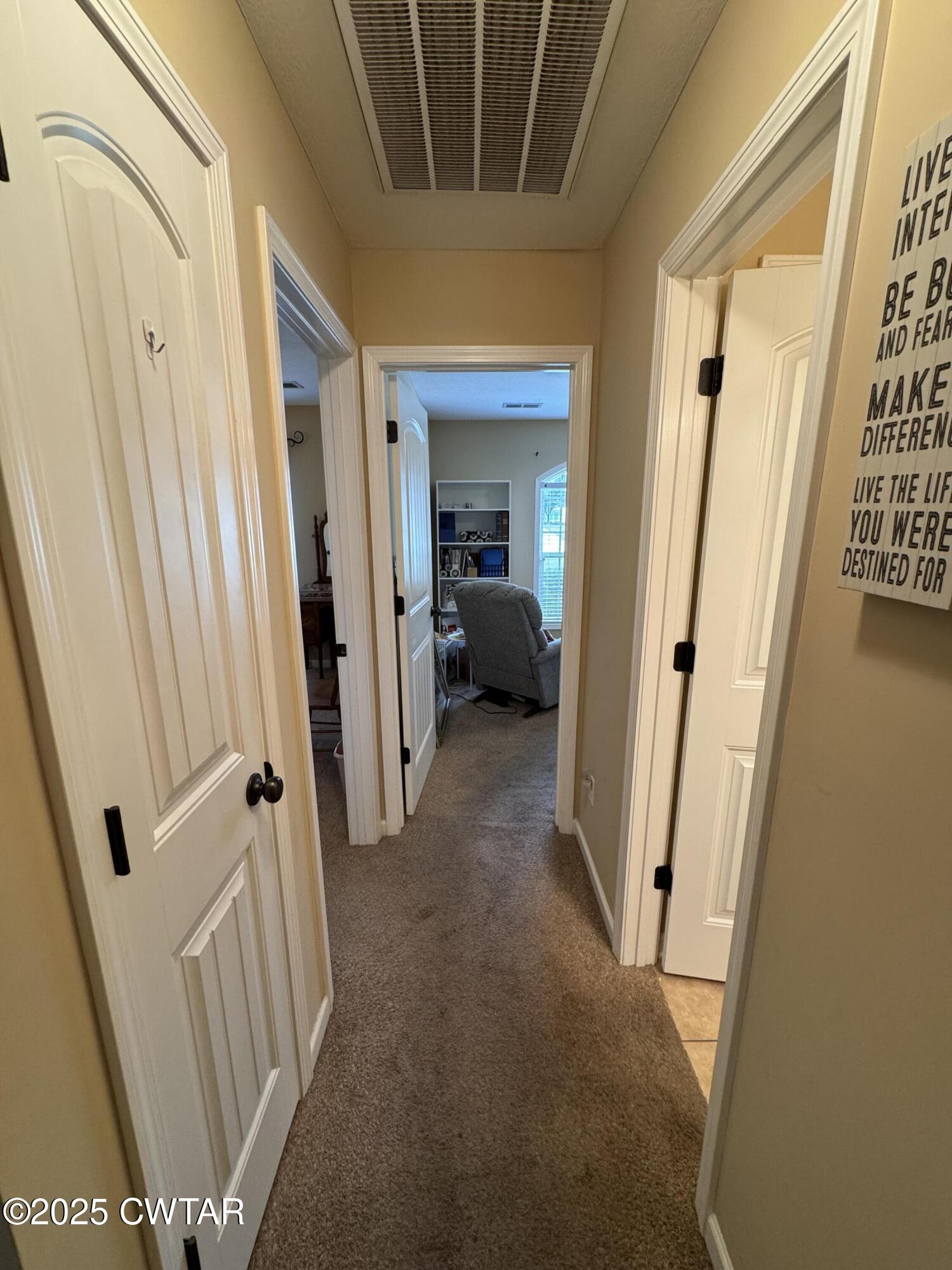 5111 Rolling Meadow Milan, TN 38358 - Photo 19 of 36 a view of a hallway view with furniture
