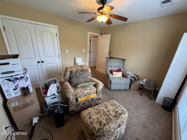 a aerial view of a house with a yard
