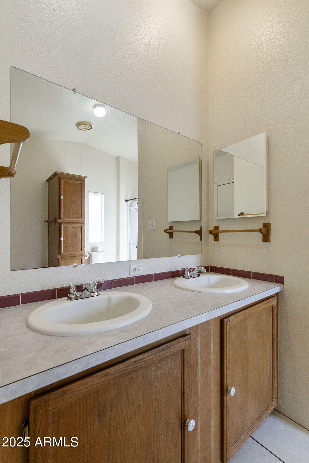 3700 South Tomahawk Road, Unit 80 Apache Junction, AZ 85119 - Photo 21 of 41 a bathroom with a sink and a mirror