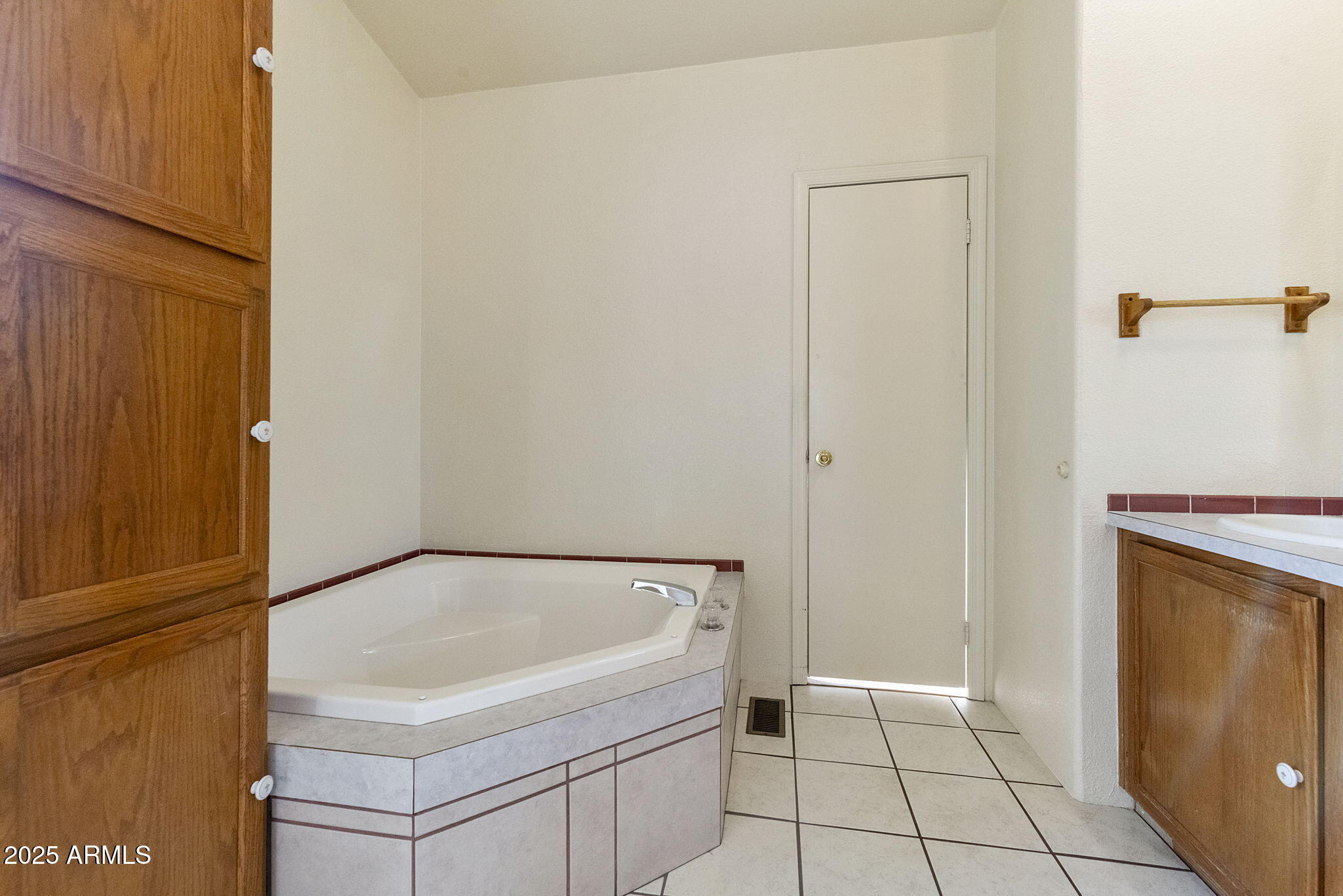 3700 South Tomahawk Road, Unit 80 Apache Junction, AZ 85119 - Photo 22 of 41 a bathroom with a bathtub and shower