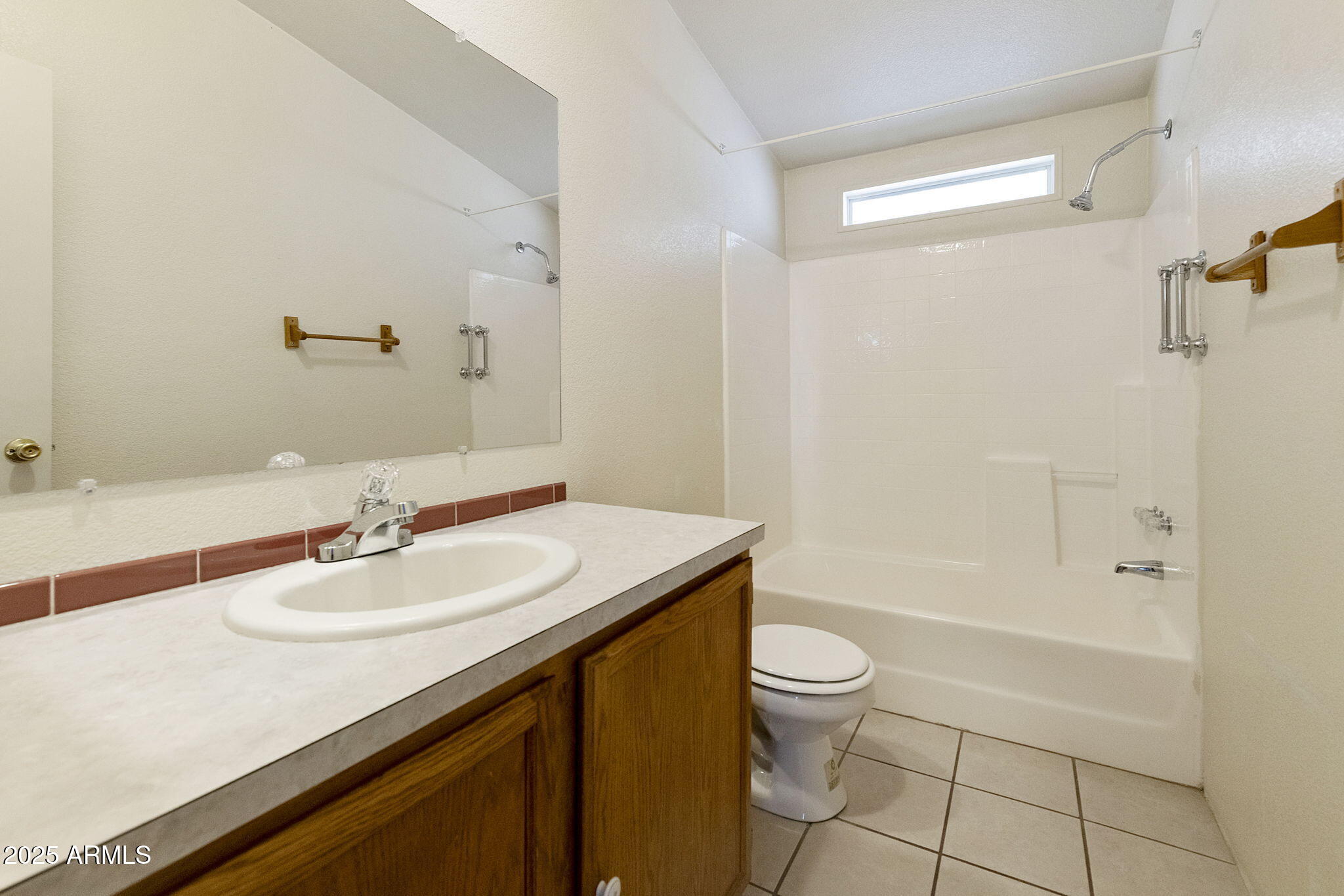 3700 South Tomahawk Road, Unit 80 Apache Junction, AZ 85119 - Photo 23 of 41 a bathroom with a sink a toilet and shower