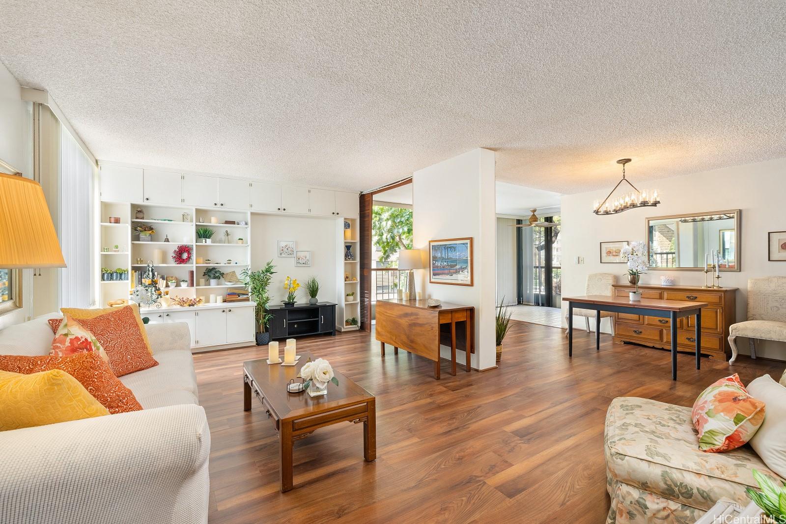 This bright, expansive, open concept living room shows beautifully.