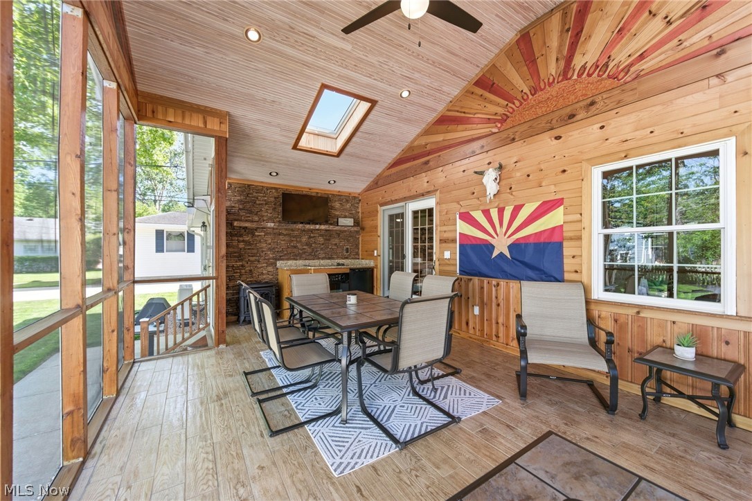 233 Sunset Road Avon Lake, OH 44012 - Photo 33 of 50 Screened porch featuring vaulted wood-paneled ceiling with skylights and recessed lighting