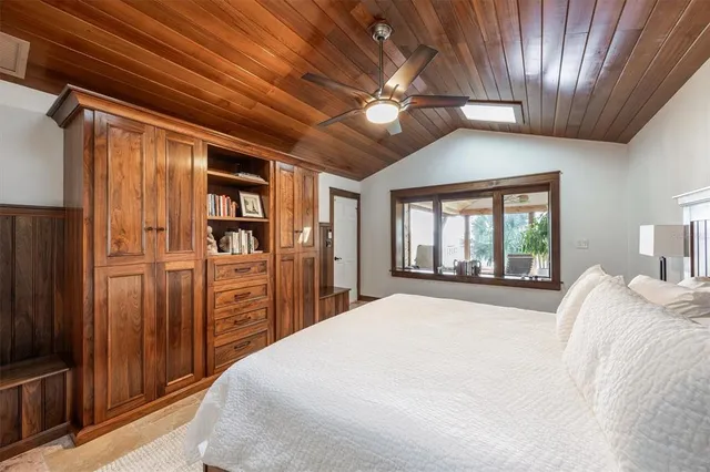 a view of a porch with furniture and garden