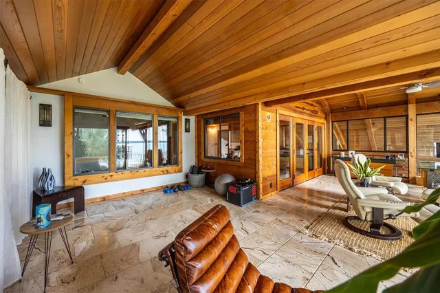 a view of a chairs and table in a patio