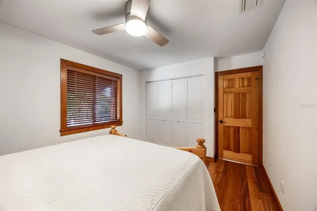 a view of a lake with a house in the background