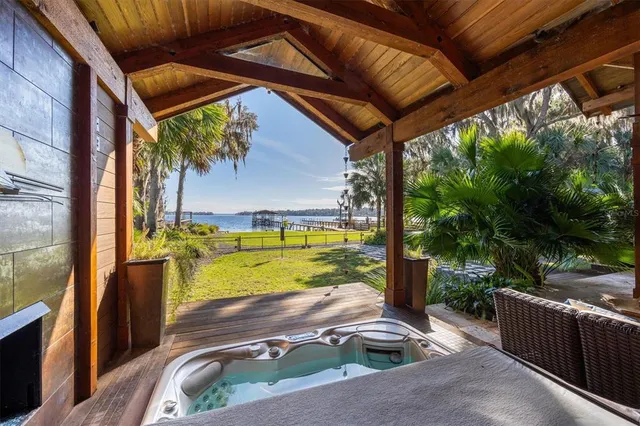 a kitchen with a refrigerator and a sink
